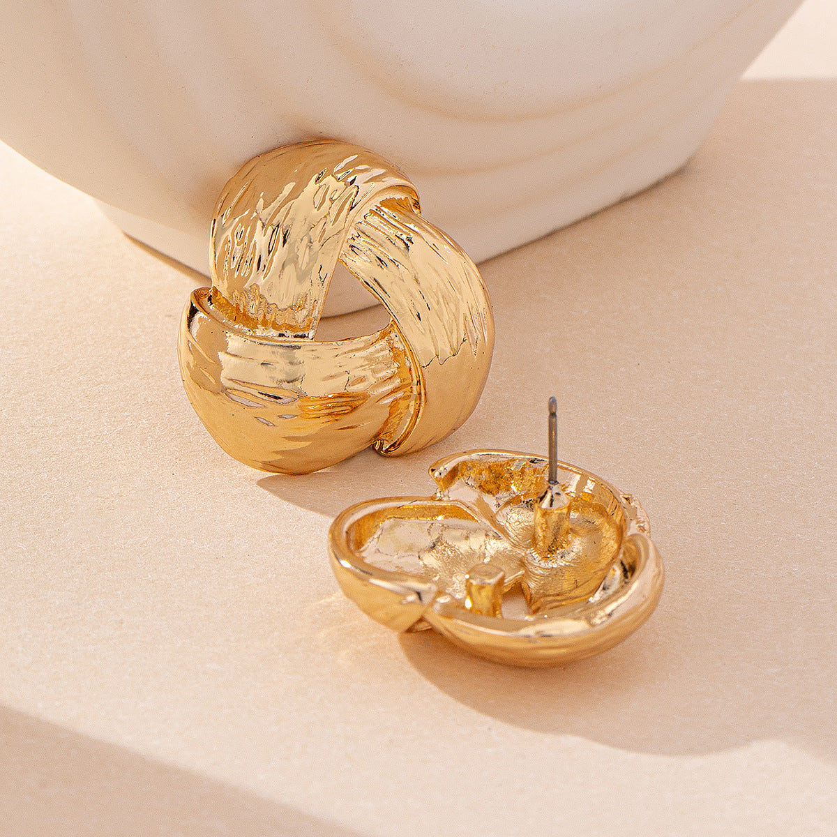 Twisted Gold Hoop Earrings: Timeless Chic!