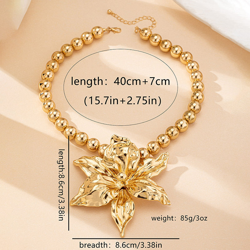 Bold Floral Statement Necklace: Golden Glamour!