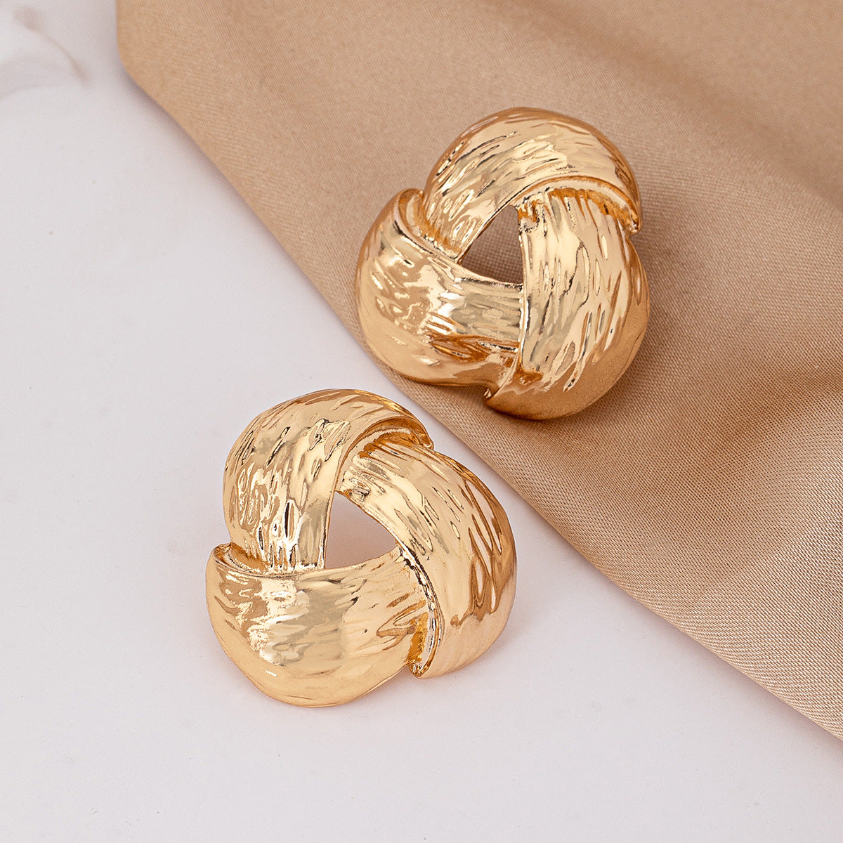 Twisted Gold Hoop Earrings: Timeless Chic!