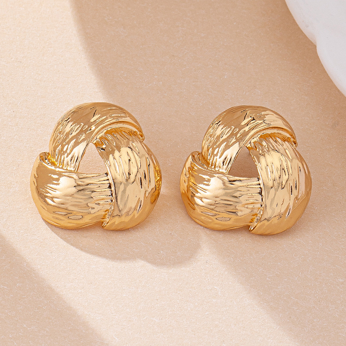 Twisted Gold Hoop Earrings: Timeless Chic!