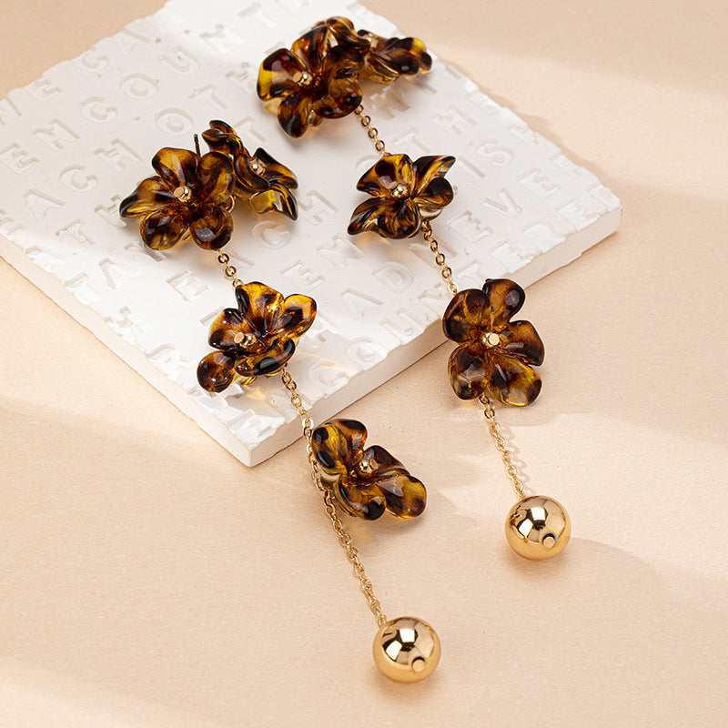 Charming Floral Drop Earrings: Elegant & Playful!