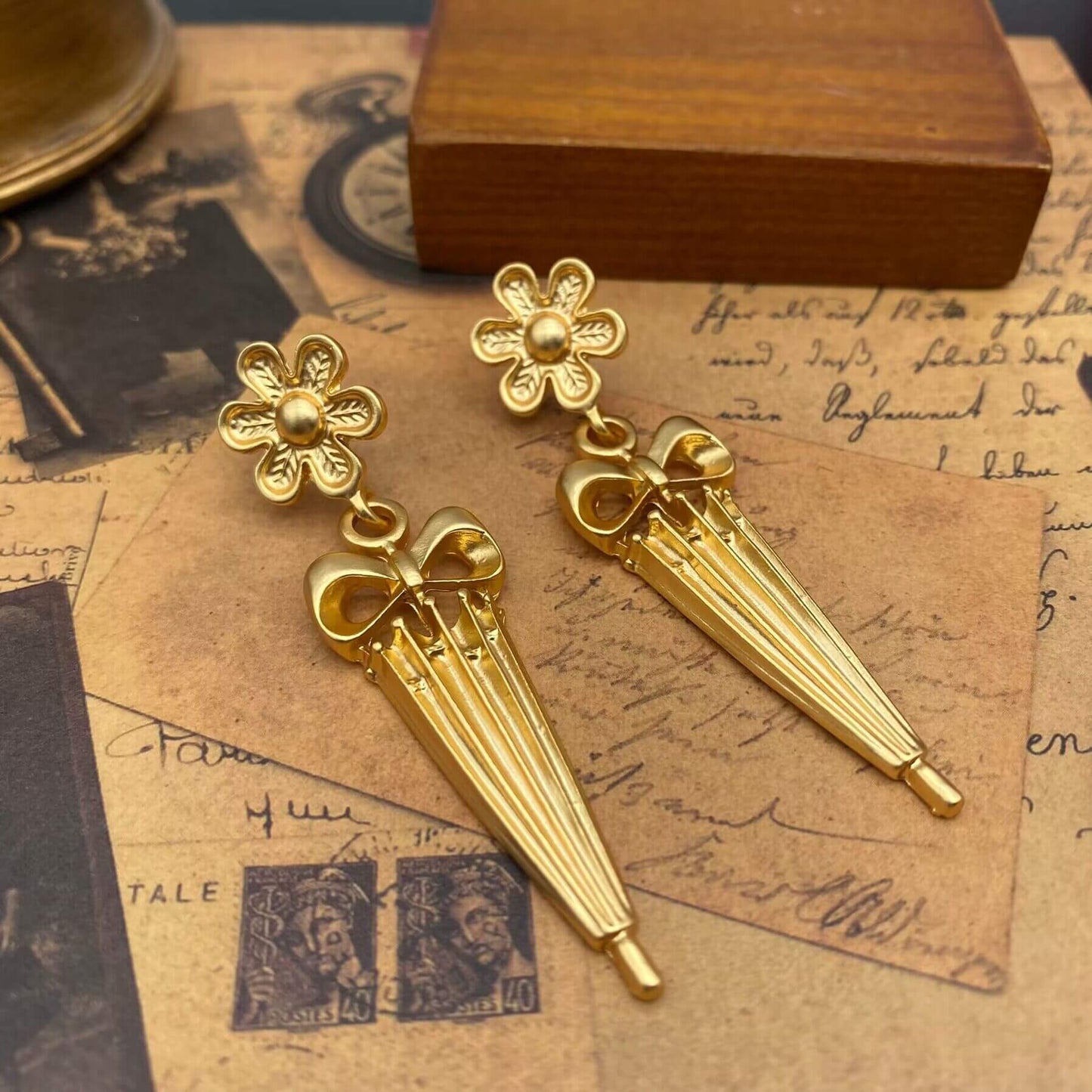 Gold bow earrings