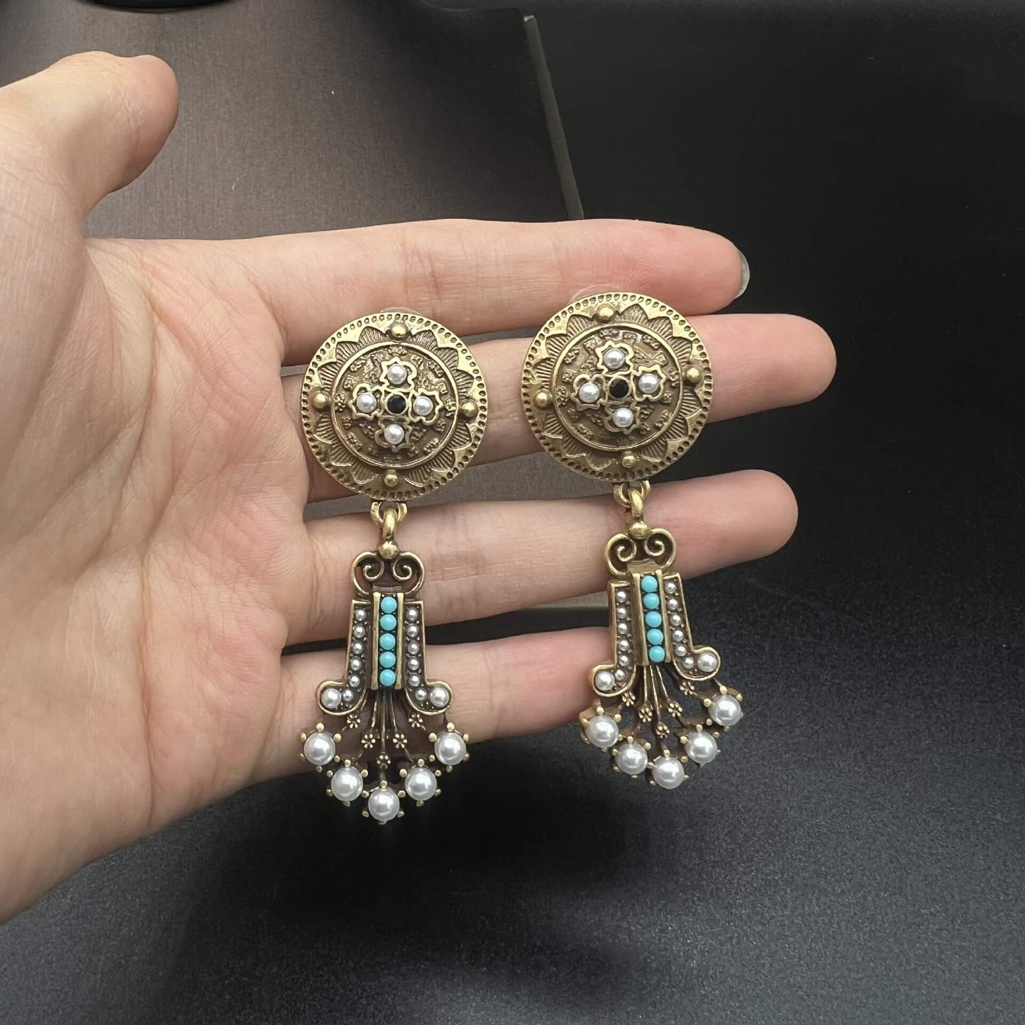 Round tassel earrings