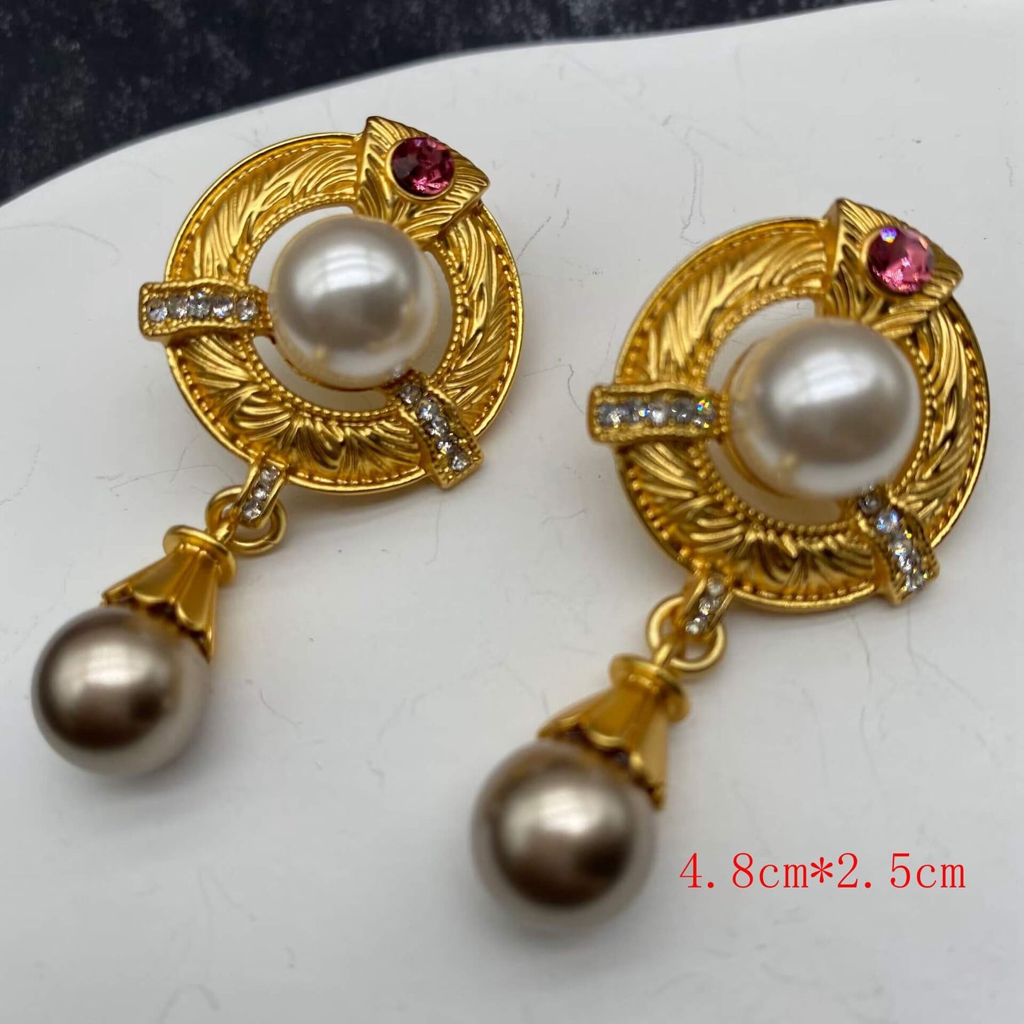 Two Pearl Earrings