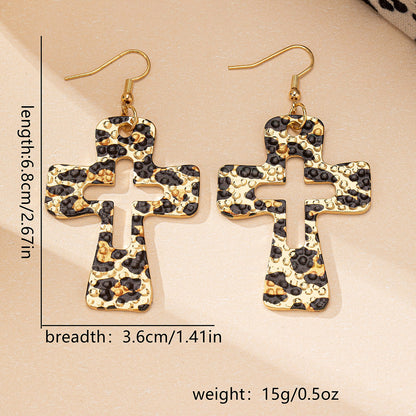 Bold Leopard Print Cross Earrings: Edgy & Stylish!