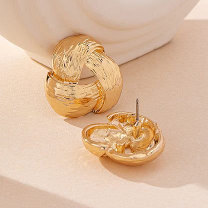 Twisted Gold Hoop Earrings: Timeless Chic!