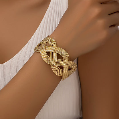 Elegant Braided Gold Cuff Bracelet: Timeless Beauty!