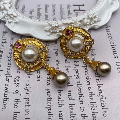 Two Pearl Earrings