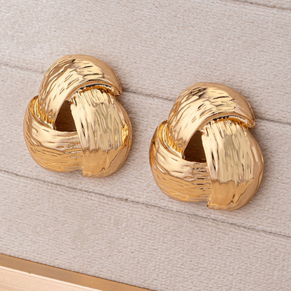 Twisted Gold Hoop Earrings: Timeless Chic!